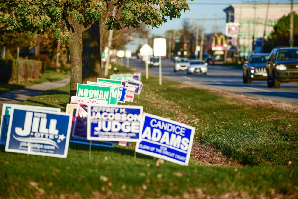 blue and white road sign